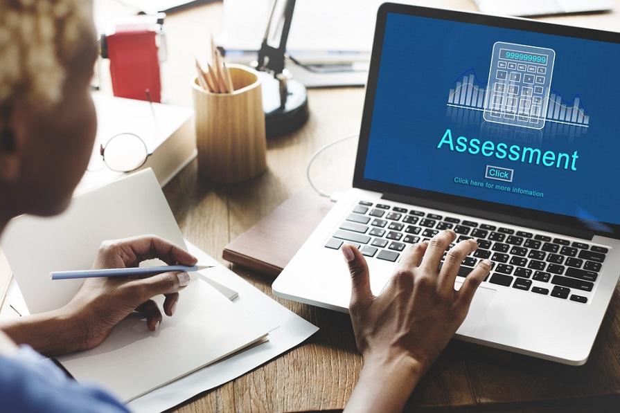woman taking online assessment